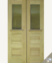 Custom Solid Red oak G133 double door entrance unit with clear insualted beveled glass and custom dentil drip cap / shelf