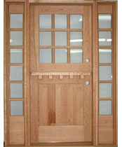 DD200 / S06 solid Cherry Dutch entrance unit with true divided light clear insulated glass. V-Grooved raised panel shown.