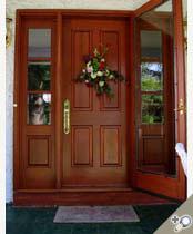 D102 / S11 Honduran mahogany finished & installed with our Manhattan screen & storm door.