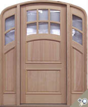 Vertical Grain Douglas Fir Custom arch top entrance unit. Featuring applied moldings and true divided light insualted glass. Corners of entry unit are also radius. Door and Sidelights are 2 1/4 inch thick.