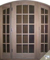 F26 Arch top true divided light french door unit with insulate glass custom S18. Shown in Solid Maple.