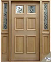 EU123 entrance unit in solid vertical grain Douglas fir with RM6 applied moldings and glue chip beveled leaded glass.