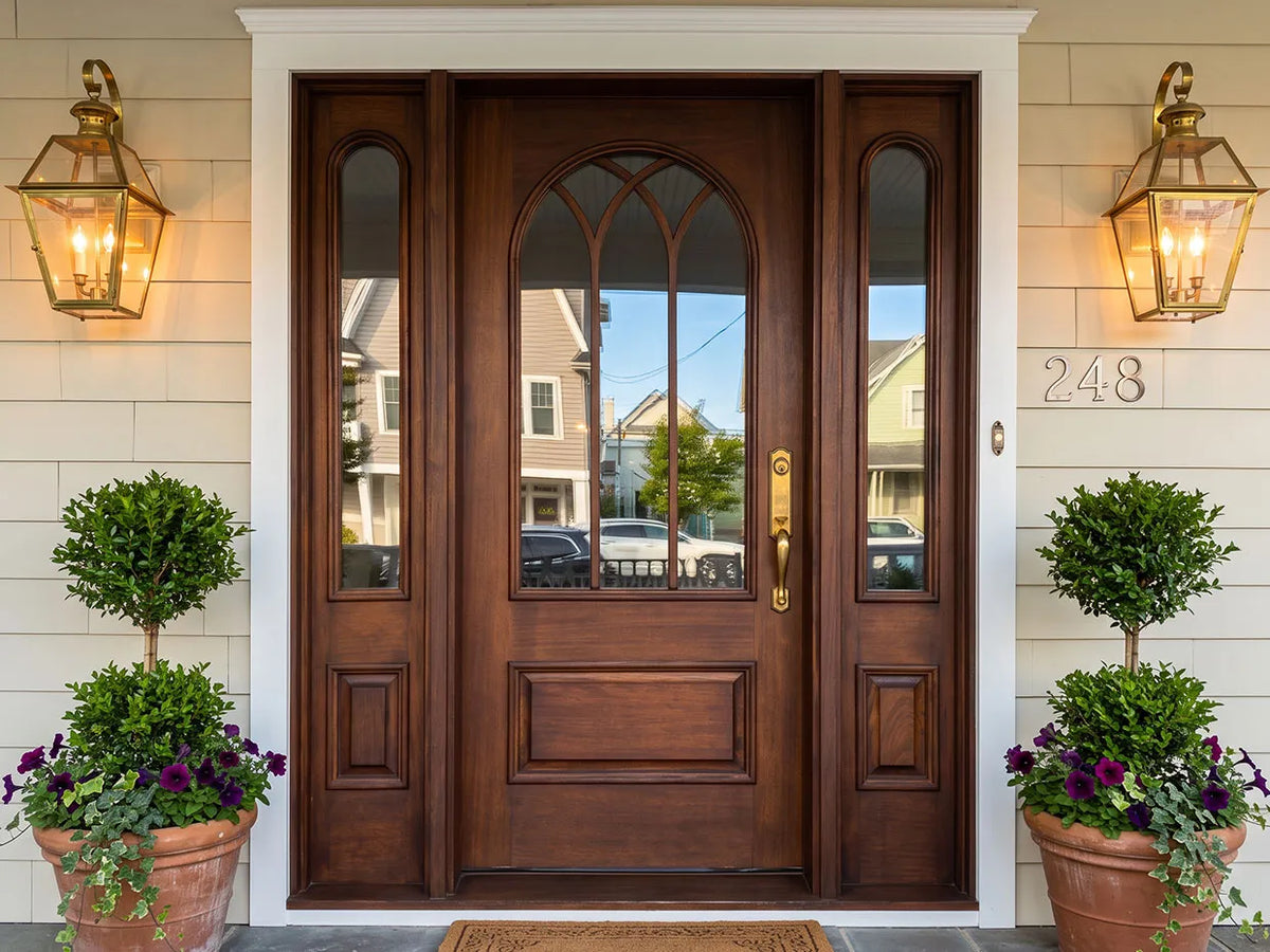 Front entry door with arched window and sidelights