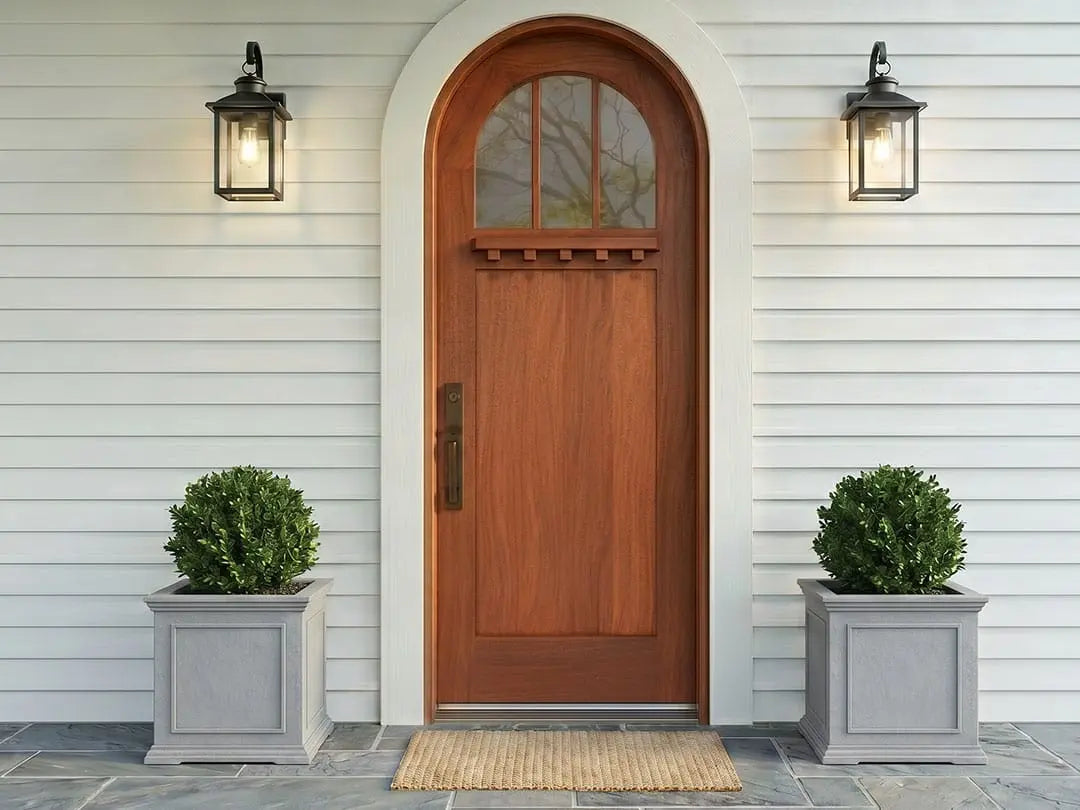 Arched front doors that follow the opening