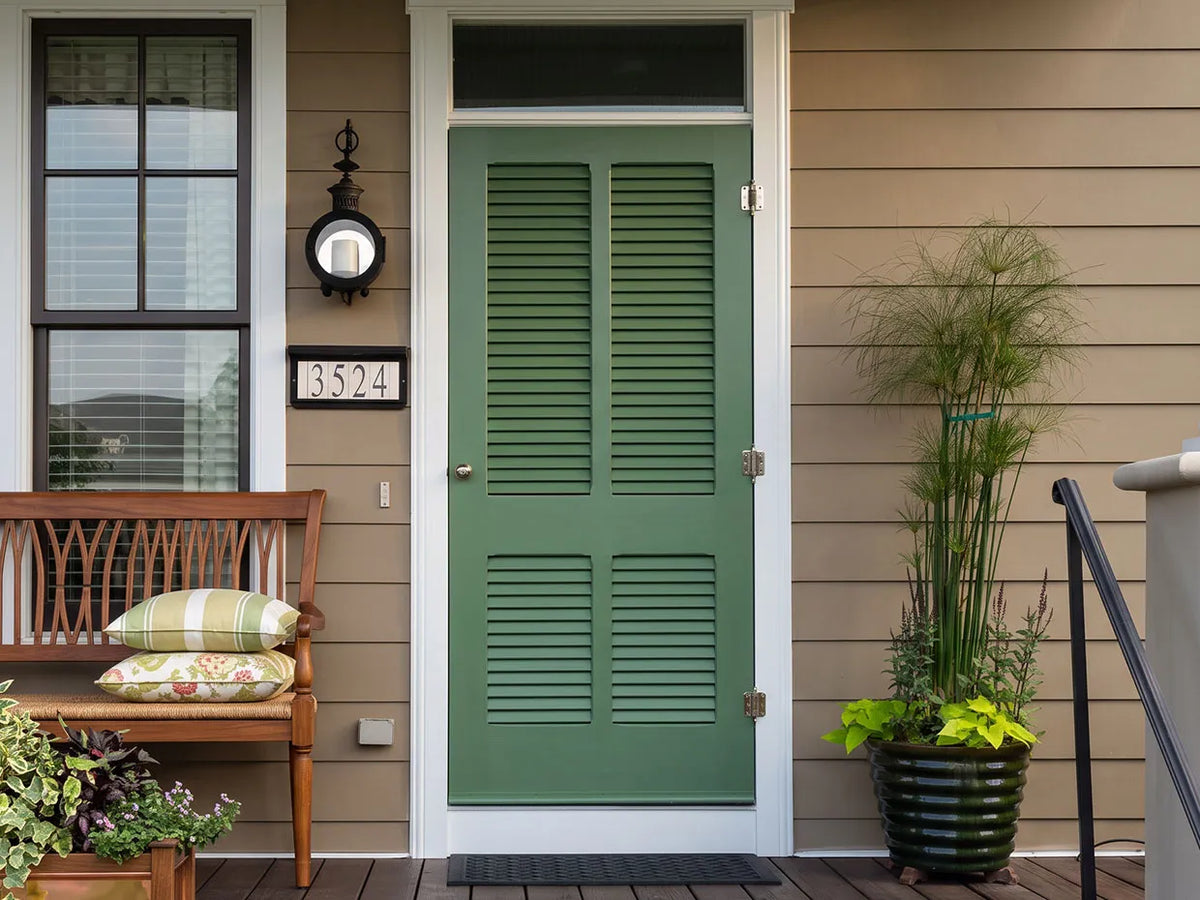Louver screen door on a front porch