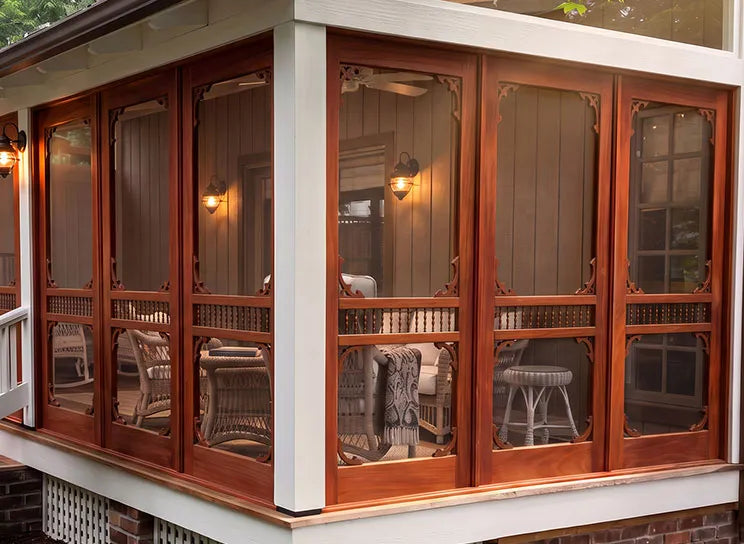 Enclosed porch with custom Victorian porch panels